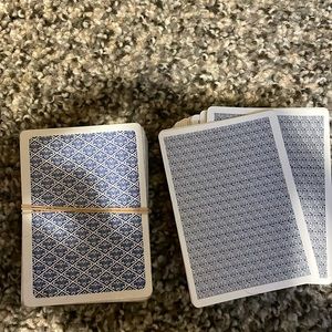 Three sets of playing cards,